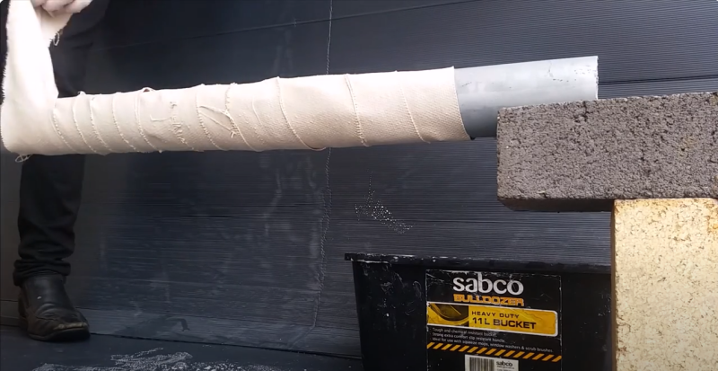 Aplicación de tejido de fibra de vidrio rehumectable